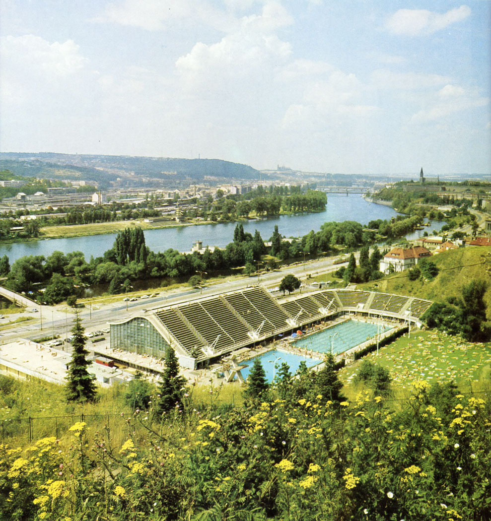The modern swimming stadium in Podoli is one of the most popular sports facilities visited by Prague sportsmen. It was designed by Richard Podzemny and opened to the public in 1965.
